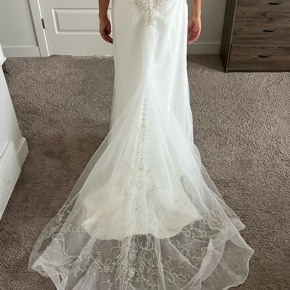 Elegant White Beaded Wedding Dress - Picture 3 of 7
